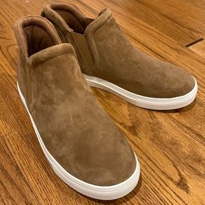 Also tan suede slip on sneakers